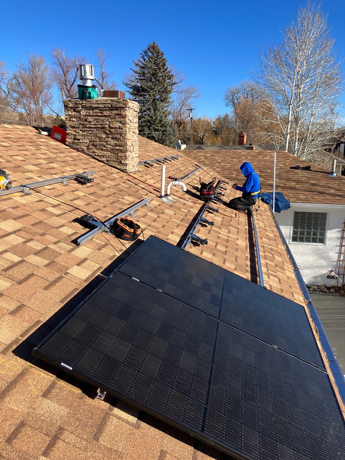 solar panels being installed on a residential roof